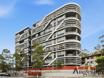 Sun Washed Apartment with District Views in Vibrant Bankstown Setting