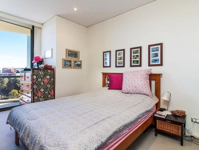Sundrenched Two Bedroom Apartment with Hybrid Timber Floorboards