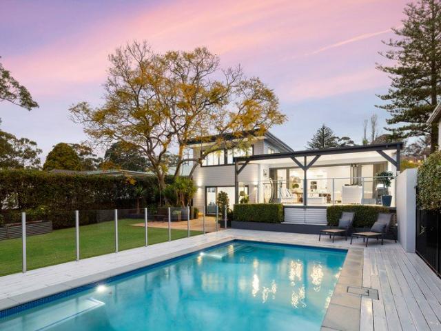 Sunlit coastal family entertainer in prized family setting