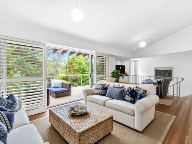 Sunlit Coastal Living in a Premier Palm Beach Setting