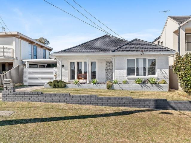 Sunlit Family Home Just Metres from the Water