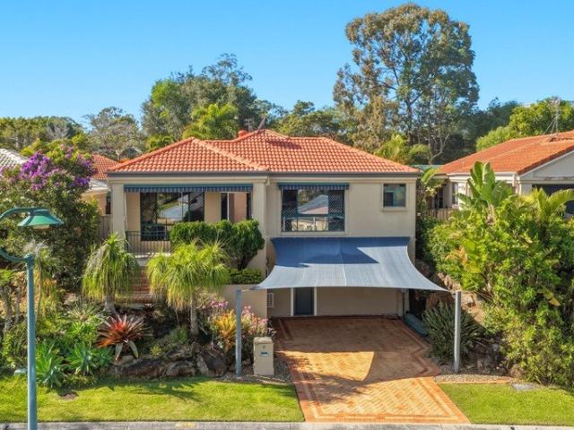 Sunlit Family Living with Mountain Views in a Peaceful Robina Pocket