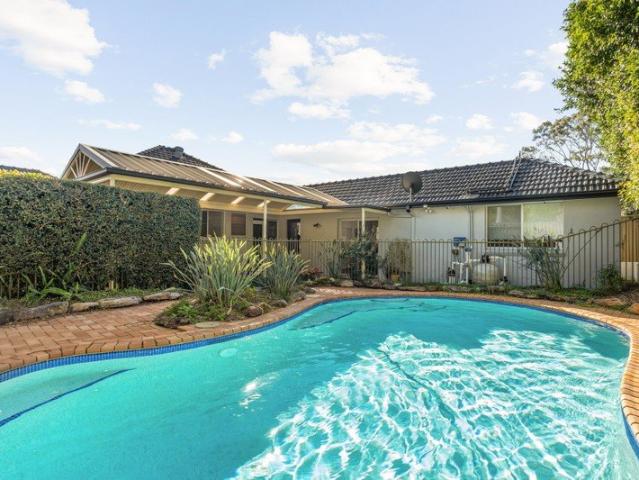 Sunlit Family Sanctuary with Poolside Entertaining