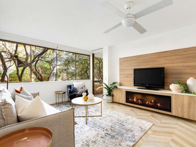 Sunlit living and a leafy outlook