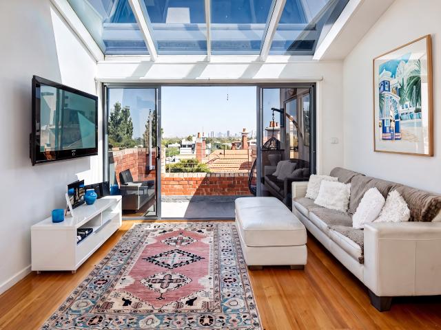 Sunlit St Kilda Apartment with Private Rooftop Terrace