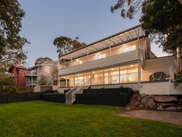 Sunlit Renovated Coastal Living with Elevated Water Views