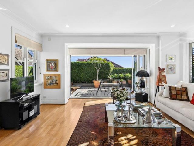 Sunlit townhome in private and quiet harbourside setting Access from Cremorne Lane