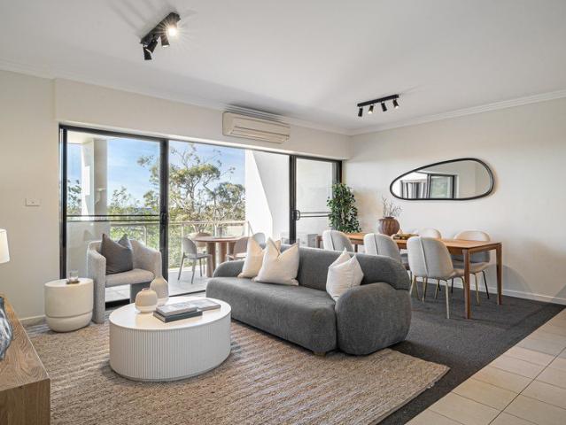Sunlit top floor apartment in a central location
