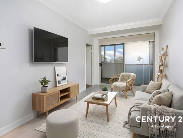 Sunlit Two Bedroom Apartment with Spacious Covered Balcony