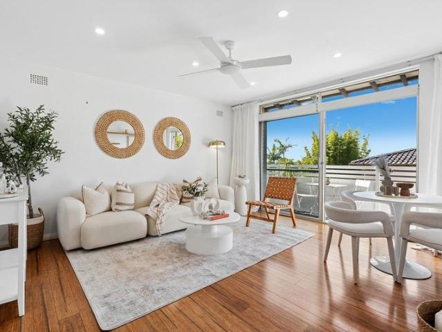 Sunny top floor living in a prized Freshwater setting