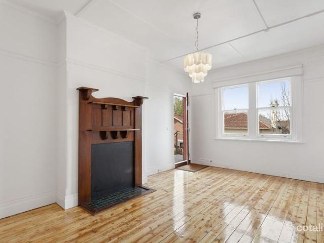 Sunny apartment on vibrant shopping strip