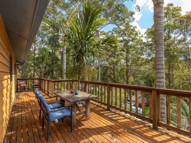 Sunny Elevated 3 Bedroom Retro Home with Multiple Living Areas