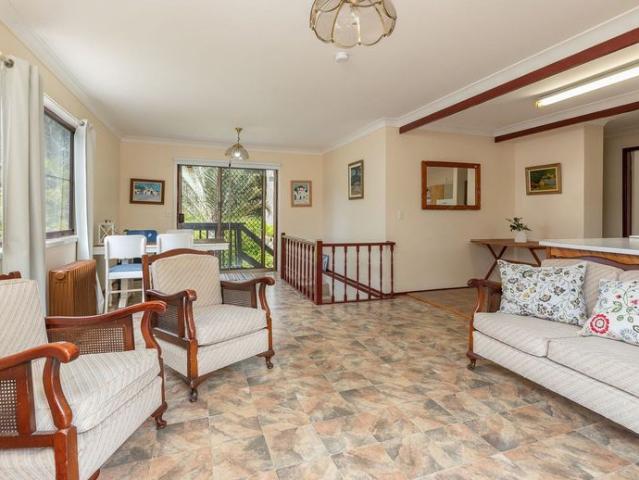 Sunny Elevated 3 Bedroom Retro Home with Multiple Living Areas