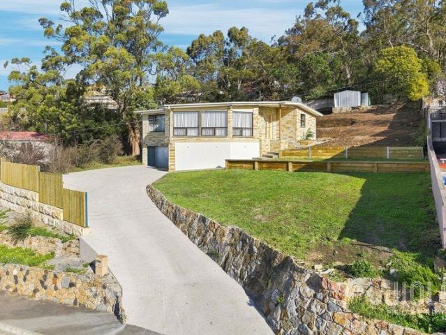 Sunny, Elevated Family Home with Stunning Views!