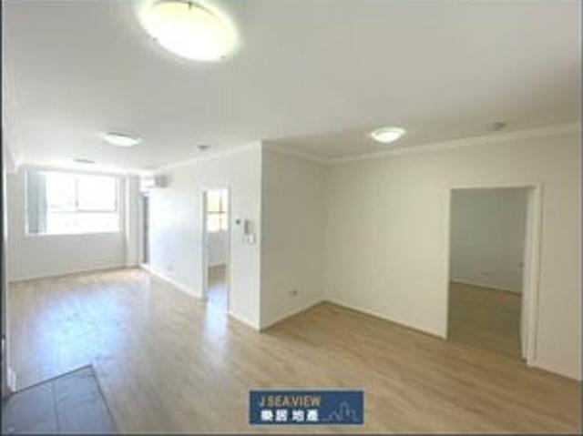 Sunny North Facing High Level Timber Floor 2 Bedroom Apartment with Olympic Stadium View for LEASE Only $720 per week!
