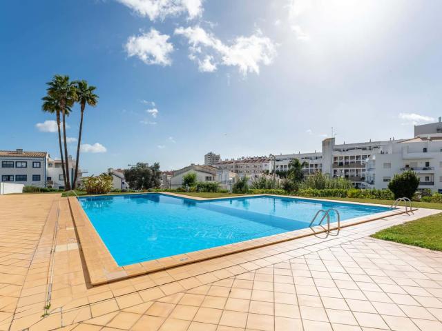 Sunny Retreat w/ Pool and Balcony