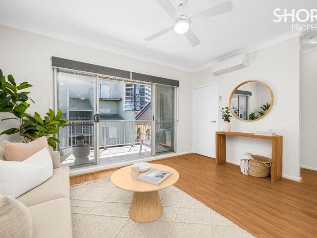 Sunny, Secure Two Bedroom Unit with Pool, Gym and Secure Parking