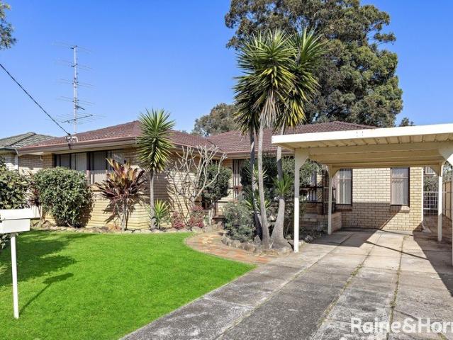 Sunny Single Level Living! Space to Entertain