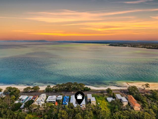 Sunsets Over the Passage, Bushland Serenity Behind The Ultimate Bribie Beachfront Retreat