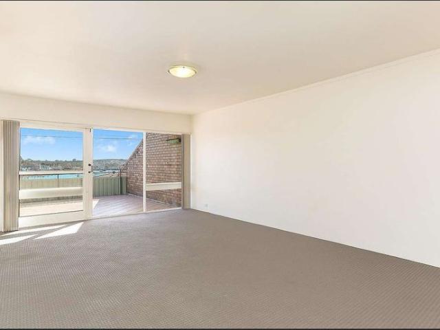 Sunsoaked & Spacious Two Bedroom Apartment with Water Views