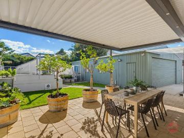 SUBURBAN FARM CHARM MEETS THE ULTIMATE SHED/MAN CAVE!