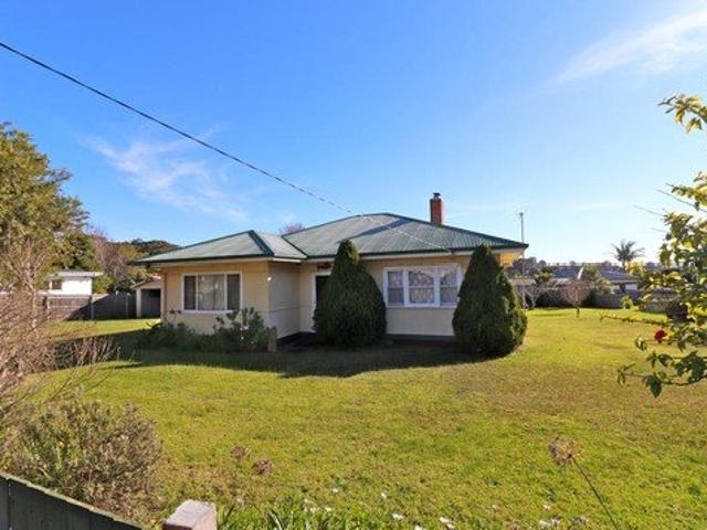Subdivided Commercial Lot with 3 Bed Home