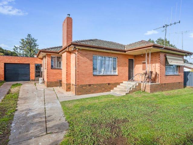 Substantial Allotment, Solid Brick Home & Outstanding Potential