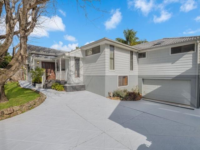 SUBSTANTIAL, DUAL LEVEL HOME WITH UNIQUE FLOOR PLAN