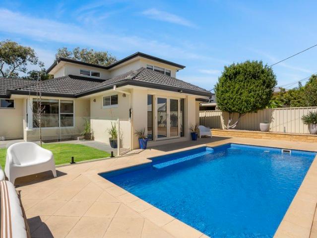Substantial Family Living & Resort Style Coastal Charm