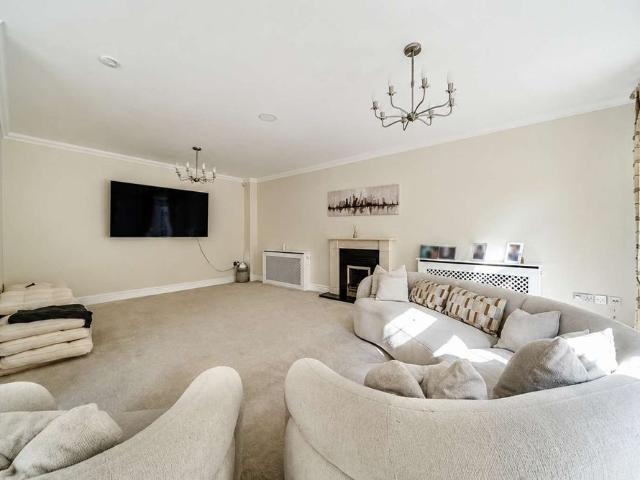 Substantial five bedroom executive home arranged over three floors in prestigious Sunningdale