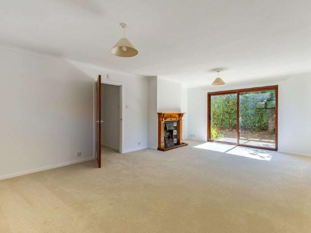 Substantial four bedroom detached home set within generous private grounds available now