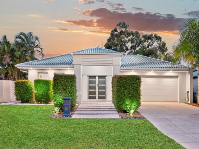 Substantial, fully renovated single level home with side access