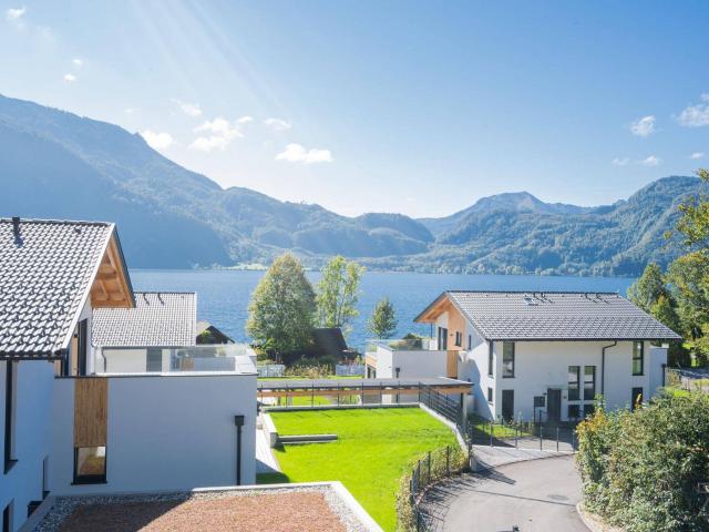 Süd West Gartenwohnung mit großer Terrasse | privater Seezugang | sofort bezugsfertig