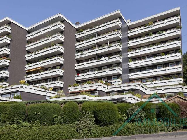 Südlage Großzügige 3 Zimmer Wohnung mit eigenem Eingang und stilvoller Architektur der 70er