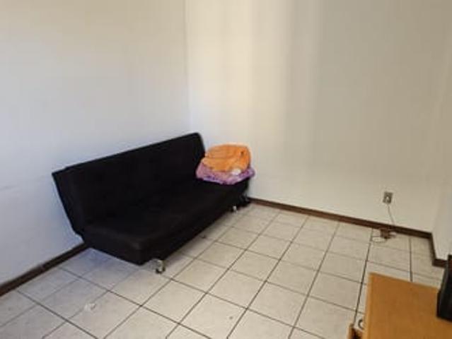 Suíte em apartamento dividido