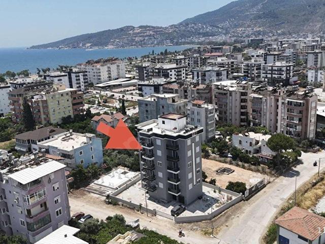 SÜPER KONUMDA DENİZ MANZARALI VE İSKANLI GENİŞ 1+1 DAİRE