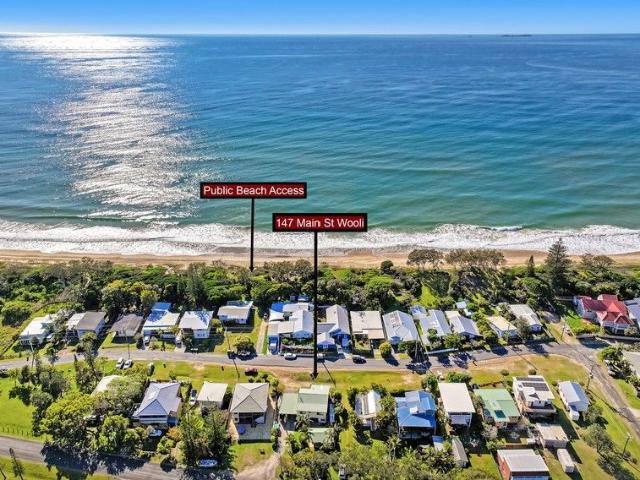 Price change Across the Road from the Beach