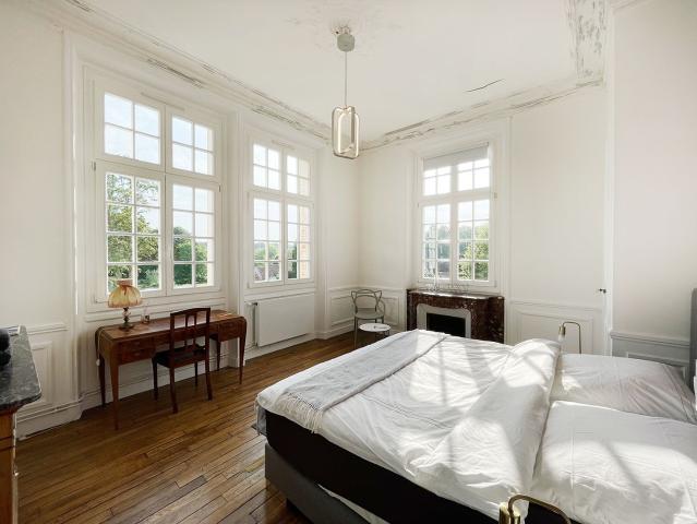 Superb duplex apartment in a chateau with pool near Paris