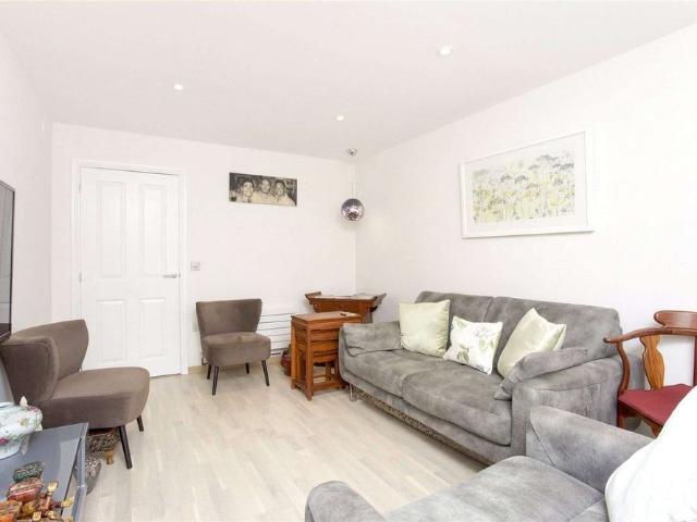 Superb three bedroom ground floor apartment set in highly desirable gated development