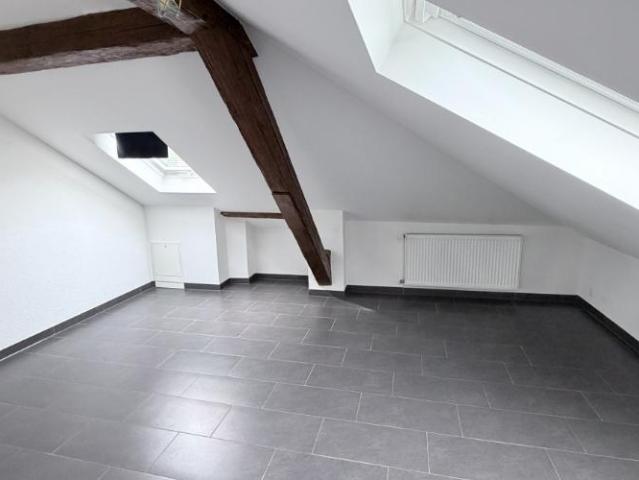 Superbe loft en attique de 52 m² avec poutres apparentes Orbe