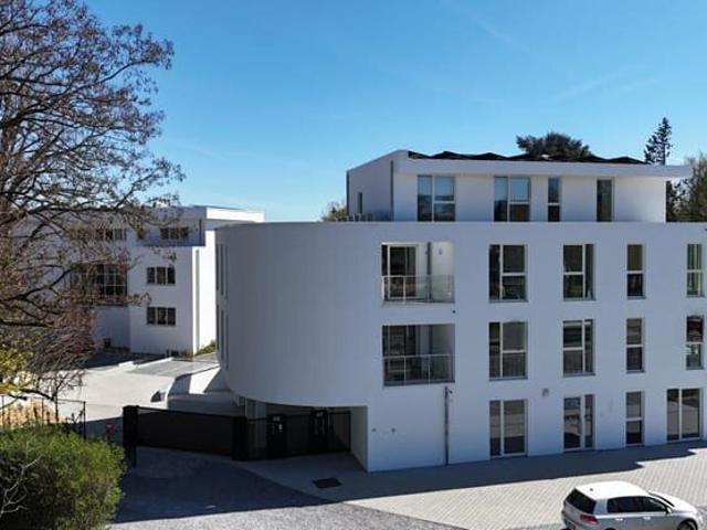 Superbe penthouse avec grande terrasse, garage et parking