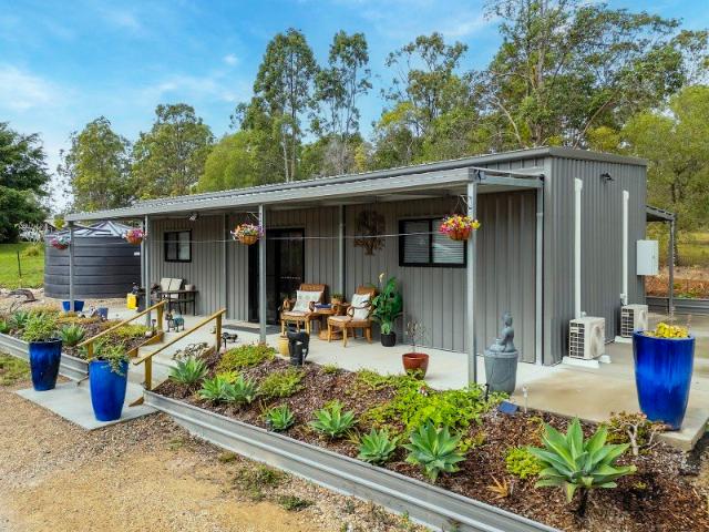 Superbly designed 2 bedroom property on a fully fenced 2 acre lot PRICE REDUCED FOR SPEEDY SALE
