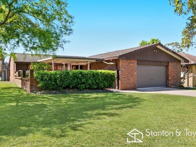 SUPERBLY MAINTAINED HOME IN CUL DE SAC LOCATION
