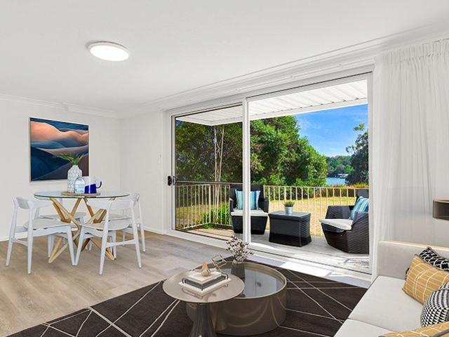 Superbly renovated waterfront apartment + LUG + AC