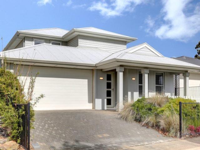 Superbly stylish 2 story home showcases easy, versatile living in this wonderful family friendly location