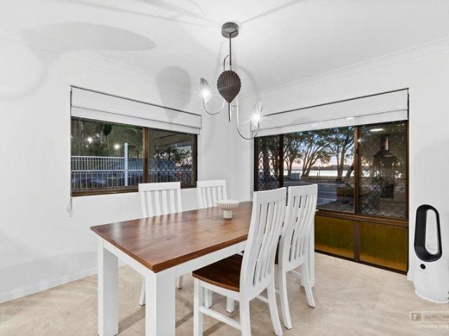 SUPERIOR GROUND FLOOR WATERFRONT UNIT!