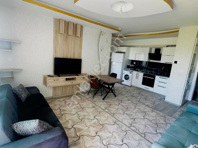 Sürer Emlak'tan Kiralık Ful Eşyalı 1+1 Dairemiz Ana Caddede