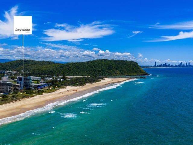 SURF'S UP! A Rare Beachside Gem