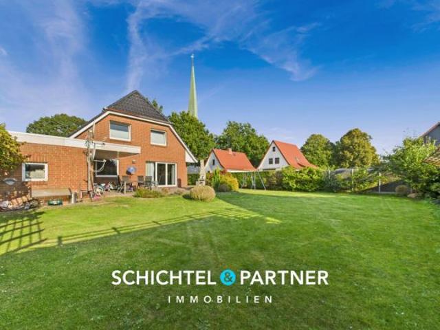 Surheide | Schickes Einfamilienhaus mit Terrasse, Garage und großem Garten