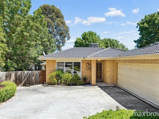 SURPRISINGLY SPACIOUS LIVING IN A PRIVATE AND CONVENIENT LOCATION